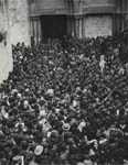 Crowd of pilgrims waiting for Holy Fire appearance near the entrance in the church of Holy Sepulcher in 1905